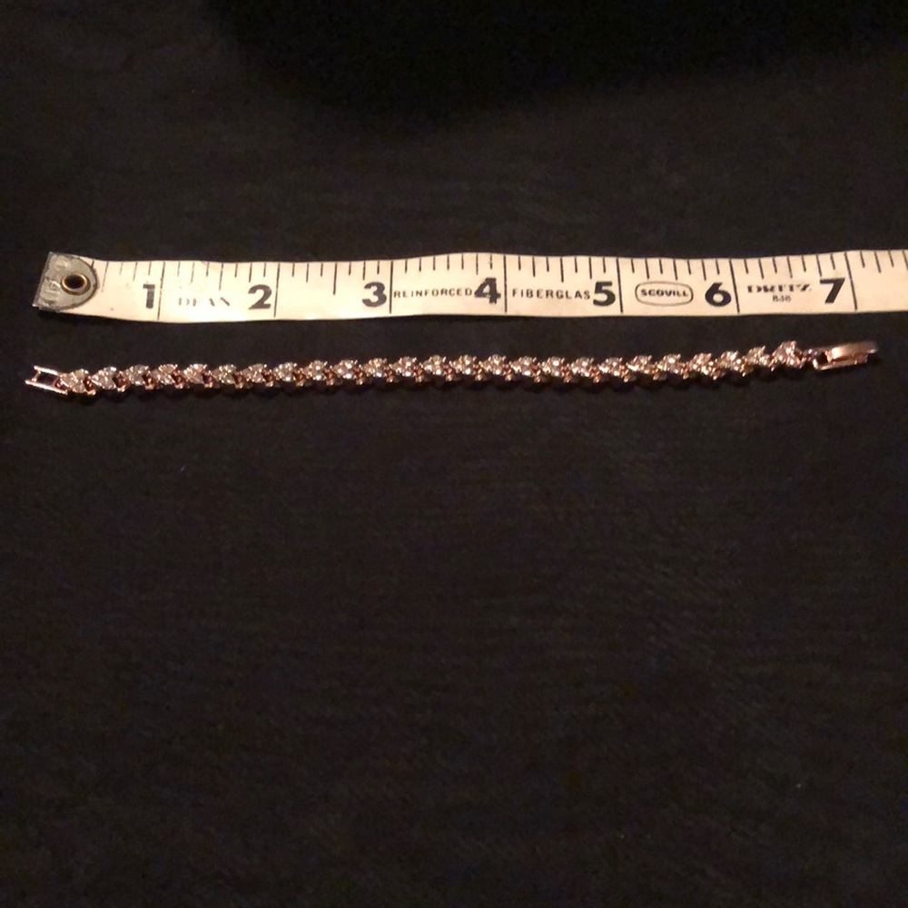 Described on purchase as Rose gold filled heart CZ bracelet